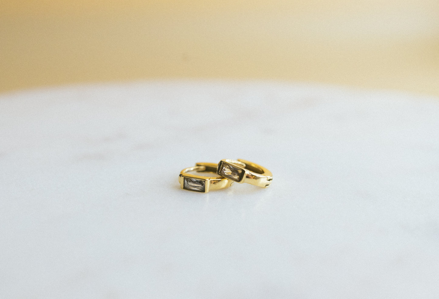 White Glow Huggies — 18K Gold-Plated White Glow Huggies Earrings